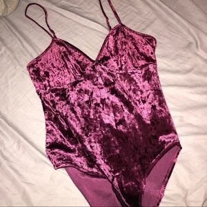 Plum velvet bodysuit.